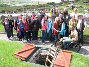 Students from Georgia at the early medieval souterrain in Glencolmcille.